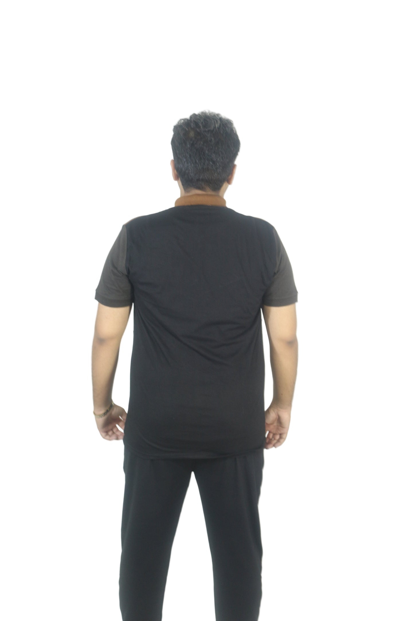 Person wearing a black outfit on a white background